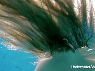 Enchanting lassie movs swell young body underwater